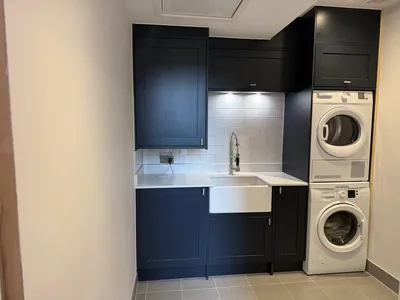 Integrated laundry appliances built into the kitchenette